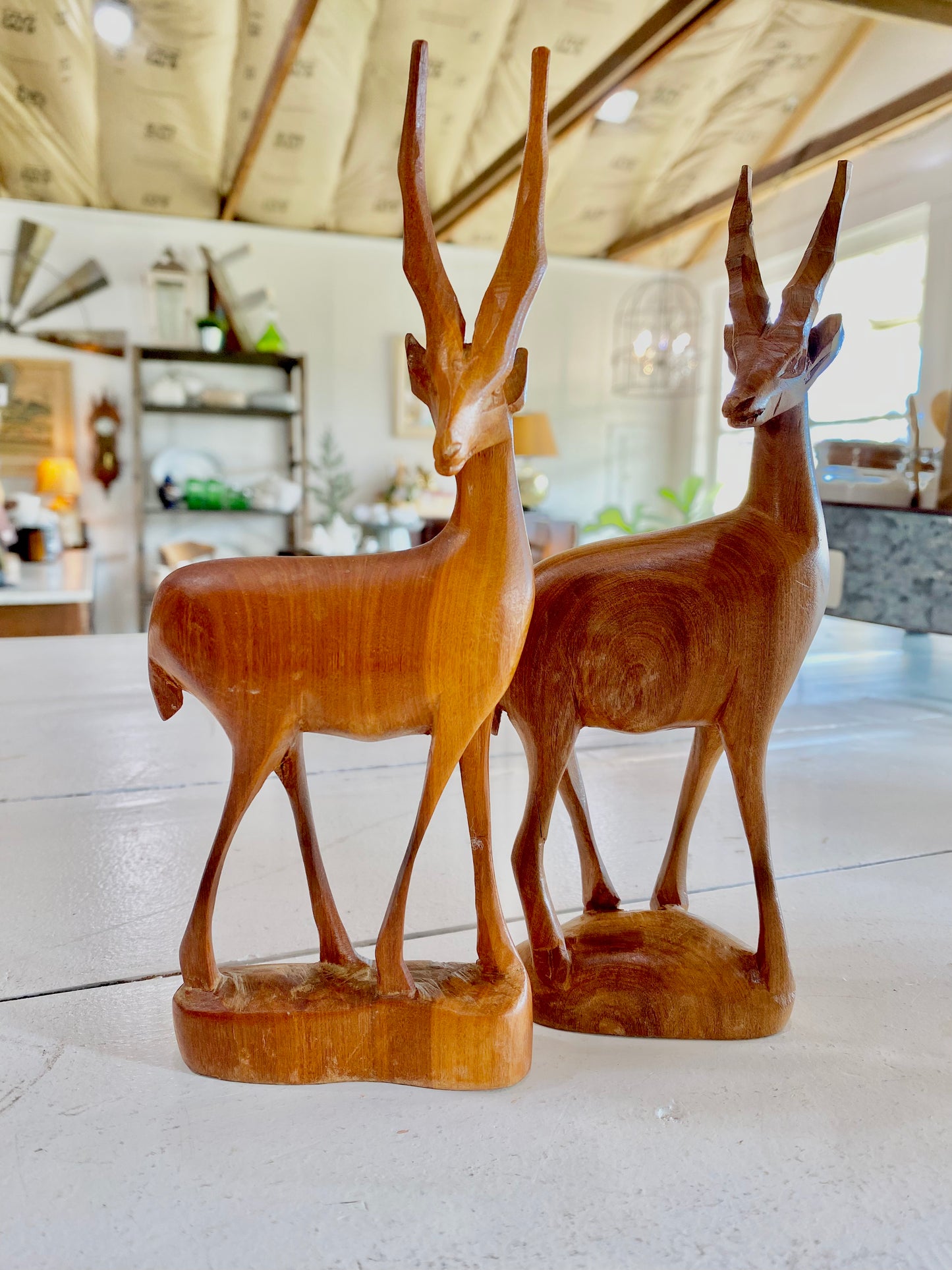 Pair of wood carved deer